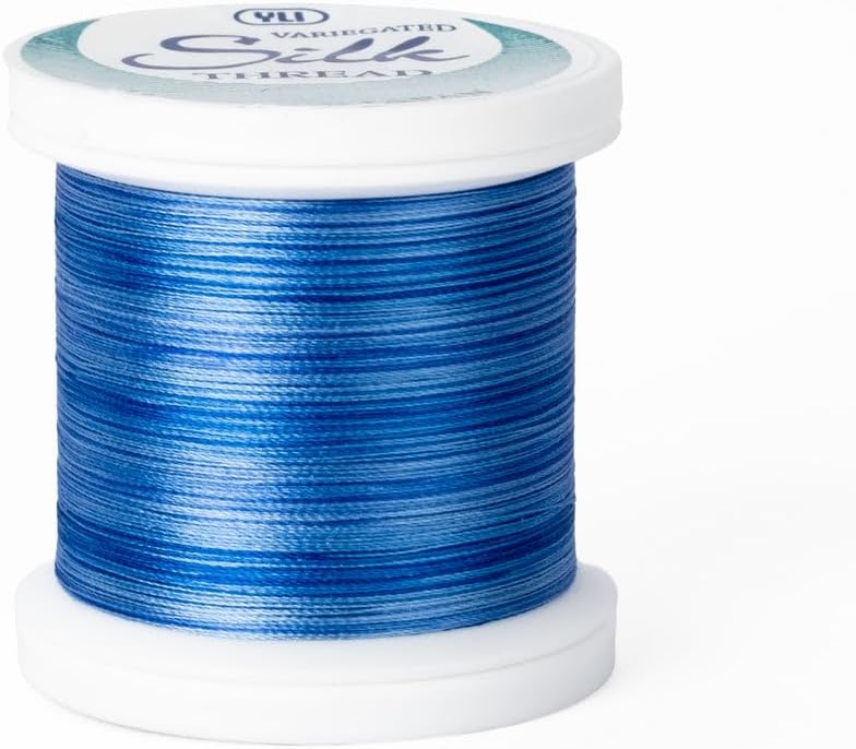 YLI Threads Silk Thread – 100 wt Fine Japanese Silk for Appliqué, EPP, and Quilting - Variegated Blue - Image 1